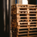 Wooden Euro pallets with EPAL sign, one of top of the other.