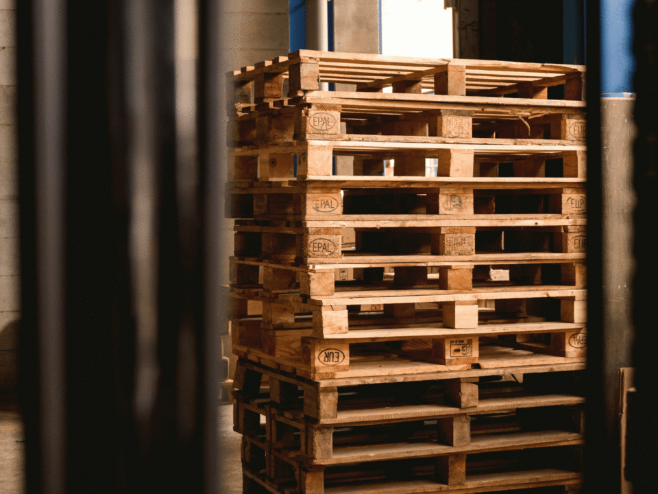 Wooden Euro pallets with EPAL sign, one of top of the other.