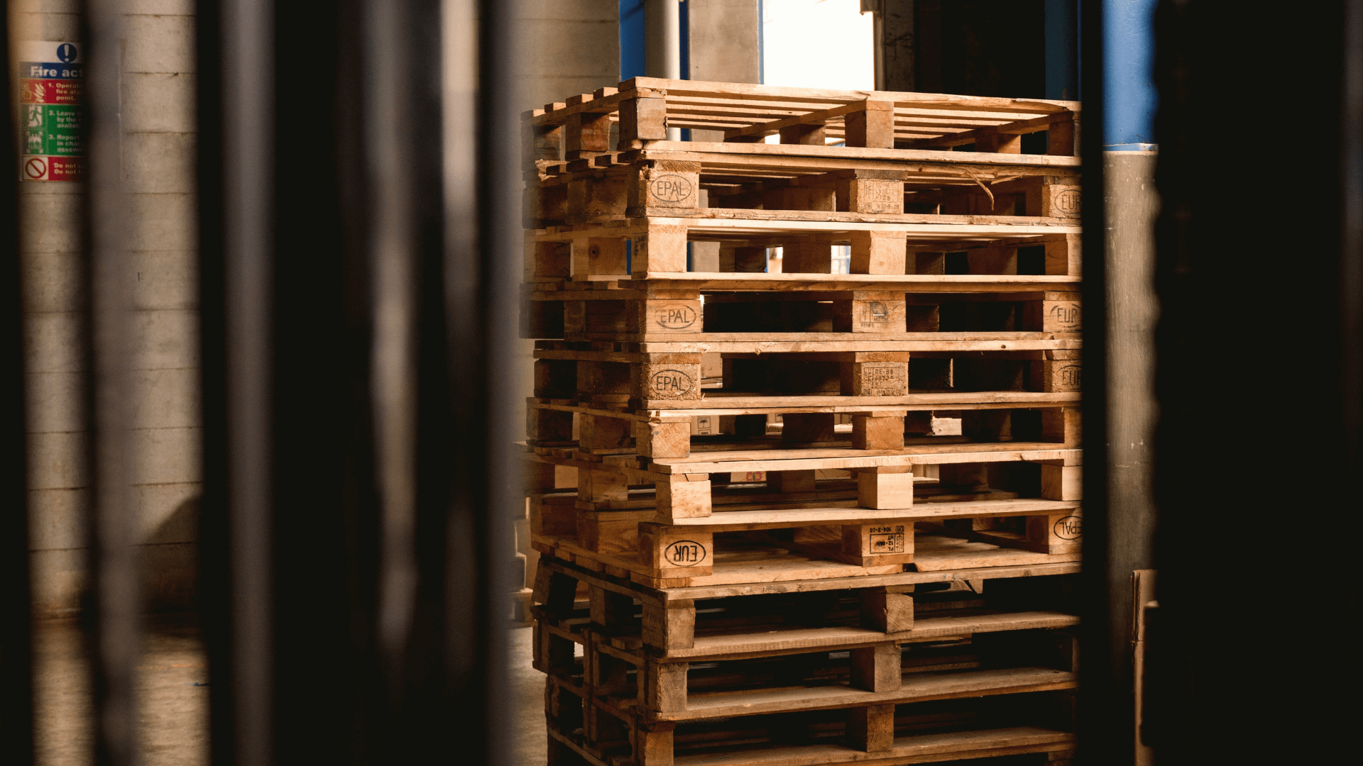 Wooden Euro pallets with EPAL sign, one of top of the other.