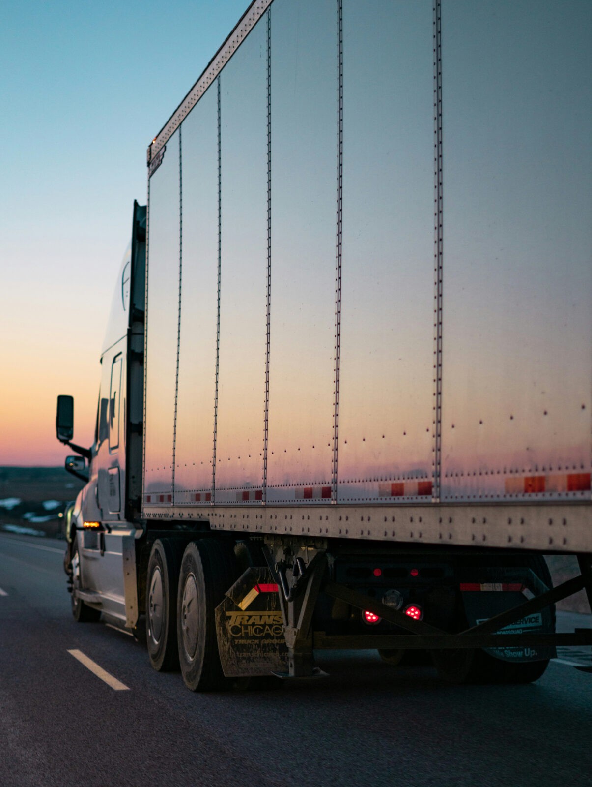 Close-up of a delivery truck driving on a highway as a symbol of European fulfillment.