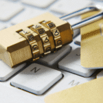 Golden padlock on top of a computer as a symbol of cybersecurity awareness.