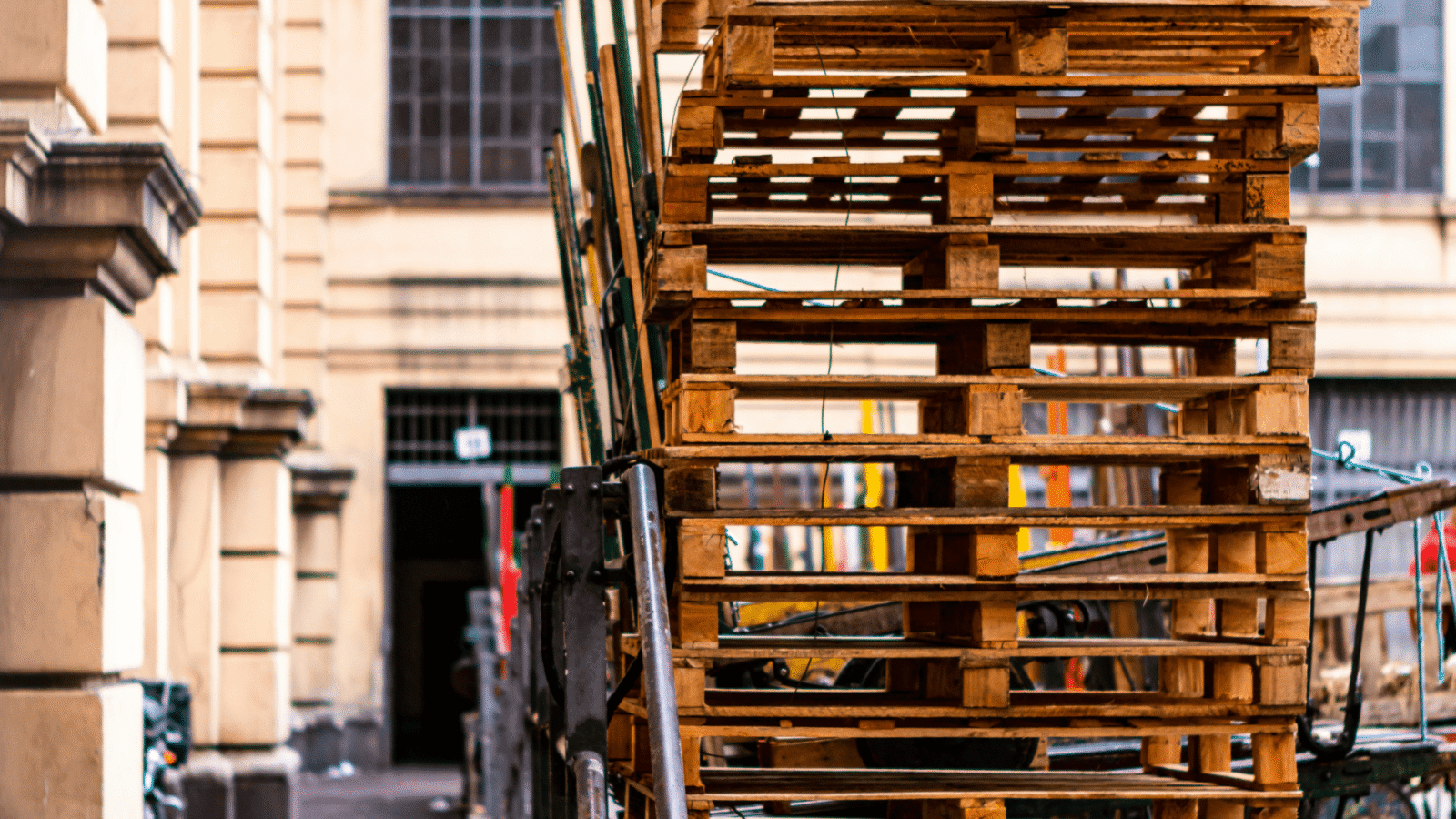 Wooden Euro pallets one of top of the other.
