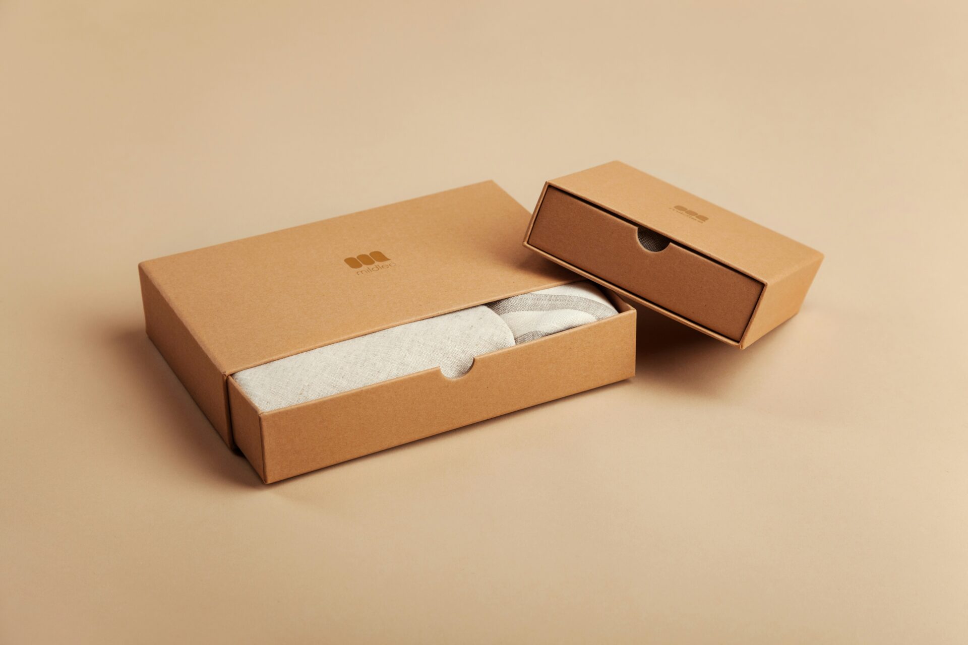 Eco-friendly e-commerce packaging box on a table, showing sustainable materials used for cost-effective shipping