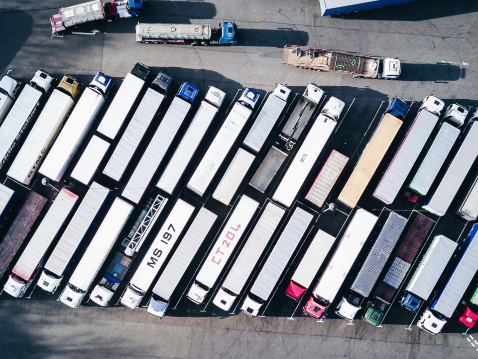 Aerial view of trucks on a parking lot as a symbol European delivery.