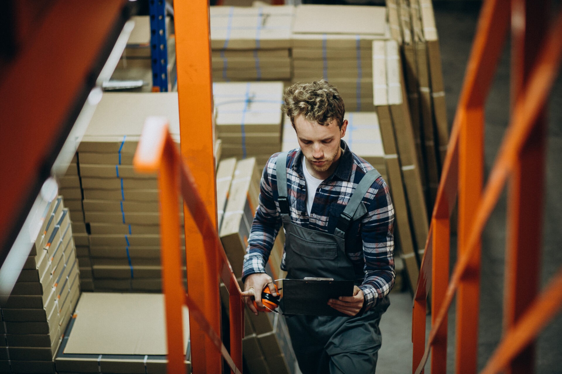 Warehouse worker counting inventory to improve stock accuracy in e-commerce.
