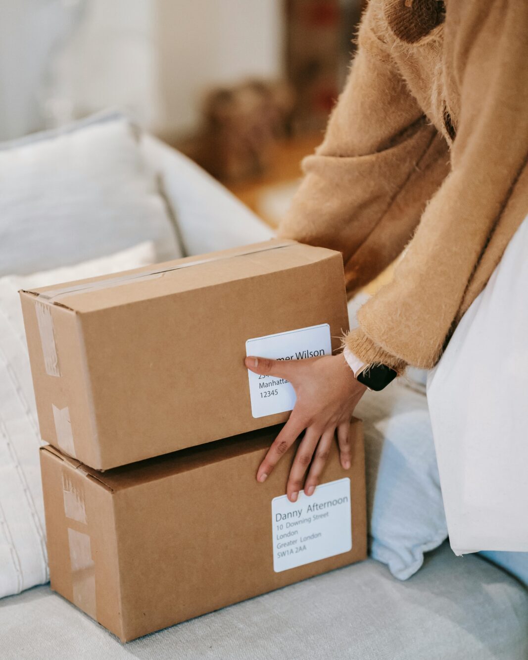 Close-up on a woman holding packages as a symbol of European shipment.